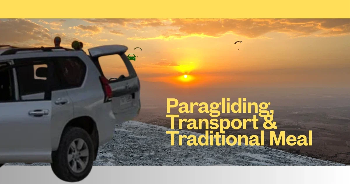 Paragliding experience with transport and traditional meal included.